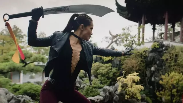 The top with braces worn by Mazikeen (Lesley-Ann Brandt) in the Lucifer series (S02E10)
