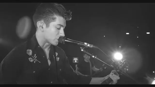 Black shirt with embroidered roses worn by Alex Turner in R U Mine live ...