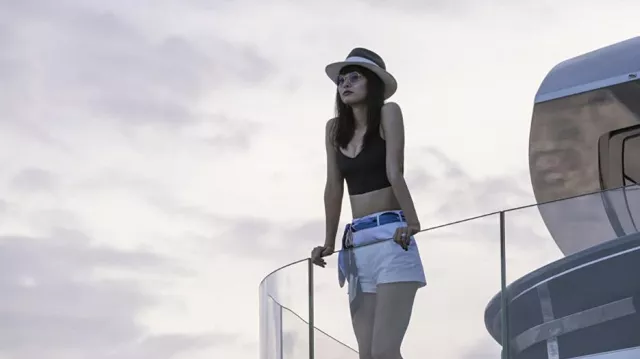 Black crop top worn by Suzi Nakamura (Shiori Kutsuna) as seen in Murder Mystery 2