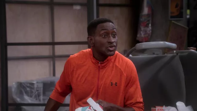 Under Armour Orange Zip Top worn by Tony (Mike Estime) as seen in The Upshaws TV series outfits (Season 3 Episode 3)