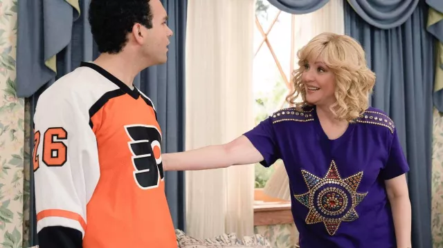 Purple Pearls Star tee worn by Beverly Goldberg (Wendi McLendon-Covey) as seen in The Goldbergs (S10E17)