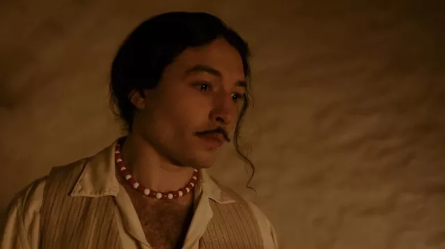 Red and white Pearls necklace worn by Young Dali (Ezra Miller) as seen in Dalíland