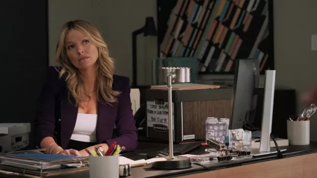 Gold watch worn by Lorna (Becki Newton) as seen in The Lincoln Lawyer TV series (S02E04)