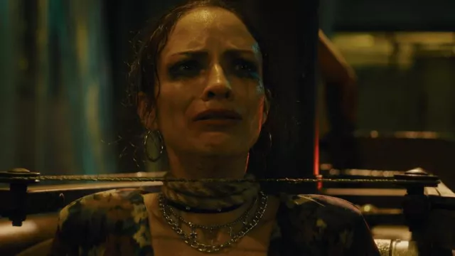 Necklaces worn by Paulette Hernández as seen in Saw X movie outfits