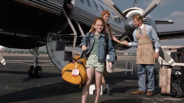 Yellow Orange duffel bag worn by Hallie Parker (Lindsay Lohan) in The Parent Trap