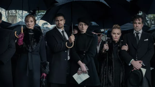 Black coat worn by Charly (Jasmine Blackborow) as seen in The Gentlemen (Season 1)