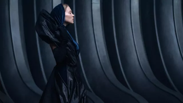 Black hood coat dress costume worn by Lady Margot Fenring (Léa Seydoux) as seen in Dune: Part Two