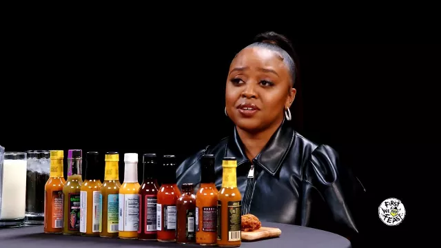 Leather Zip Jacket worn by Quinta Brunson as seen in Hot Ones on February 2024