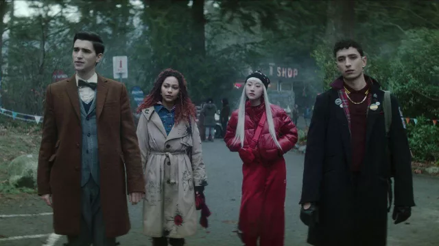 Red down jacket worn by Niko (Yuyu Kitamura) as seen in Dead Boy Detectives TV show wardrobe (Season 1 Episode 4)