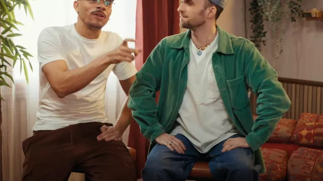 The green jacket worn by Squeezie in the YouTube video WHAT'S BEHIND THE DOOR? (feat Eric & Ramzy, Mister V)