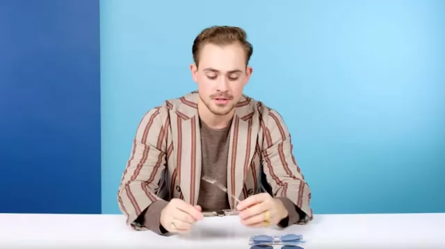 Dacre Montgomery Outfits: Beige Brown Striped Jacket in 10 Things Stranger Things' Dacre Montgomery Can't Live Without | GQ YouTube Video