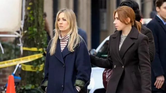 The looks of The Flight Attendant: Kaley Cuoco wears a blue coat with green cuffs to play Cassie Bowden in episode 6 of season 1