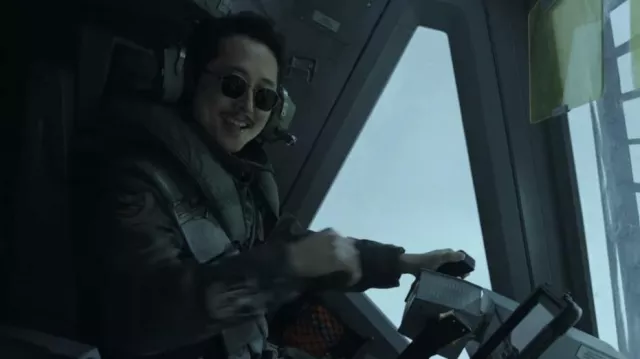 Mickey 17 Movie Outfits: Steven Yeun wears sunglasses to play Berto