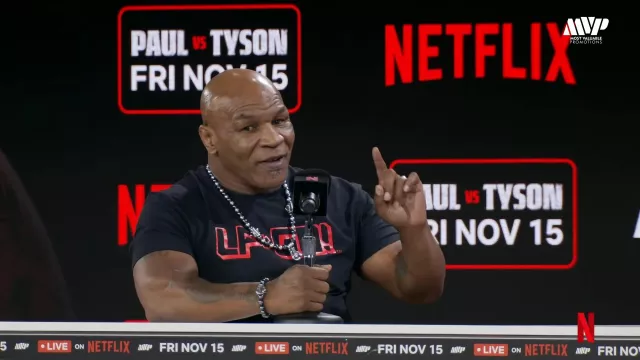 Mike Tyson was wearing Pearl necklace and bracelet set for the Jake Paul vs. Mike Tyson: Press Conference at FanaticsFest live on August 18, 2024