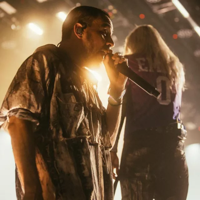 Mike Shinoda wears a jacket printed live on a photo on his Instagram account
